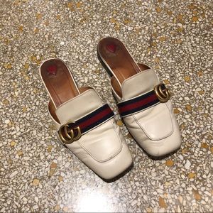 White Gucci loafers